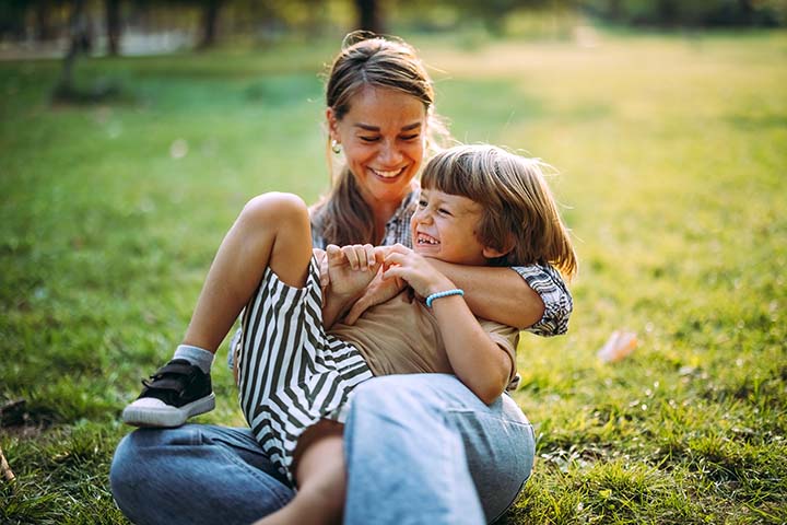 HEQ_720x480 Mom and son play in the grass